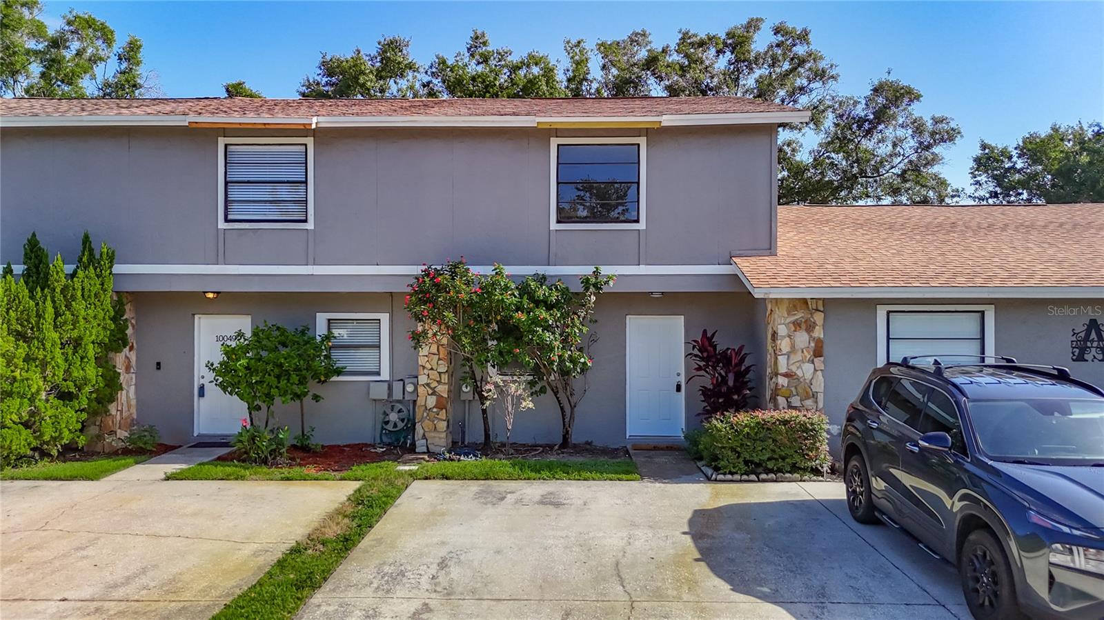 Must see this great deal! Gorgeous 2-Bedroom, 2 1/2 Bath, 1,188 sq ft townhome in Carrollwood Oaks. This place is absolutely phenomenal, features include a Brand-new AC, Brand-new roof, an open floor plan, brand new kitchen with stainless steel appliances, quartz countertops, new cabinets, remodeled bathrooms with all new faucets, finishes and light fixtures, new laminate wood floors and new carpet throughout, freshly painted interior, private master suite with on-suite bathroom. Exterior features a screened in patio and backyard. Community features a pool. This home is ideally situated, providing easy access to shopping and dining. It's a must see!
