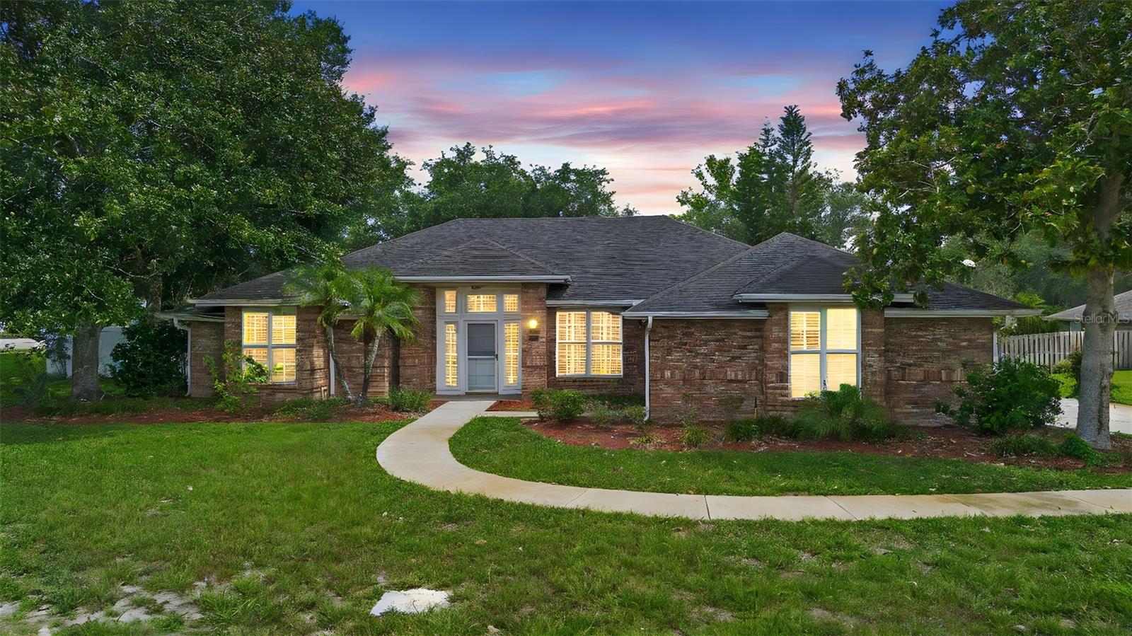 Under contract-accepting backup offers. Welcome to 317 Alexandra Woods Drive in the desirable Estates at Glen Abbey. This all-brick pool home sits on an oversized 0.63-acre lot and features 3 bedrooms, 2 bathrooms, and a spacious 3-car garage. Major updates have already been completed, offering peace of mind for the next owner. A brand-new HVAC system was installed in May 2025, and a brand-new roof is scheduled for installation on July 14, 2025. Inside, you'll find tasteful renovations throughout, including fresh paint, new flooring, a remodeled kitchen with updated appliances, and a beautifully renovated primary ensuite bathroom—all completed in 2025. With just under 1,900 square feet, the home offers a thoughtfully designed split-bedroom floor plan, two separate living areas, a formal dining room, and a cozy breakfast nook—ideal for both daily living and entertaining. Outside, the covered lanai overlooks a screen-enclosed pool and a massive fenced-in backyard, offering the perfect space to relax or host gatherings. While the garage HVAC is currently inoperable, the ductwork remains in place, allowing for an easy conversion if you wish to expand the air-conditioned space for a home office, gym, or hobby area. Conveniently located near shopping, dining, and major highways, this is a rare opportunity in one of DeBary’s most established communities. Don’t miss your chance to call this beautiful property home.