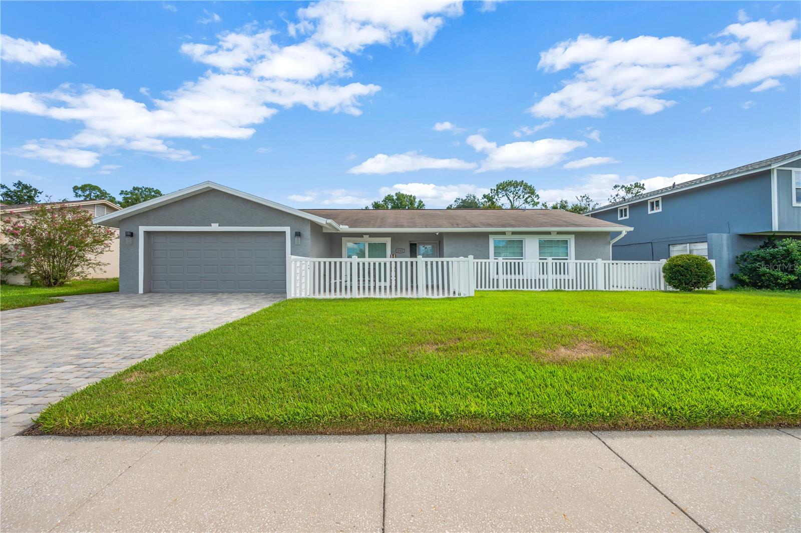 WELCOME to Bloomingdale East in Valrico! This community takes pride in A-rated schools and amenities without the burden of HOA or CDD fees. This move-in ready residence features 4 bedrooms and 2.5 baths, having been completely remodeled both inside and out. Notable upgrades include a new pool cage, an outdoor kitchen, outdoor Bluetooth speakers for poolside entertainment, pool lighting, a paved yard with a lovely green turf area, a storage shed, and a converted 2-car garage that can easily be reverted back to its original use. Additional enhancements comprise an electric fireplace, fresh paint throughout, a newly installed HVAC system (2023), an irrigation system, and beautifully tiled bathrooms. Other highlights include a privacy fence with gate access to the rear, where fruit and vegetable trees are located, as well as a front gate/fence for safety. This magnificent location has no mandatory HOA fees and provides easy access to shops, local A-rated schools, restaurants, entertainment options, major roads, and a YMCA with heated pools within the community. Bloomingdale East offers a variety of amenities, including pickleball courts, basketball, tennis, racquetball, a playground, bike trails/lanes, and a golf course.