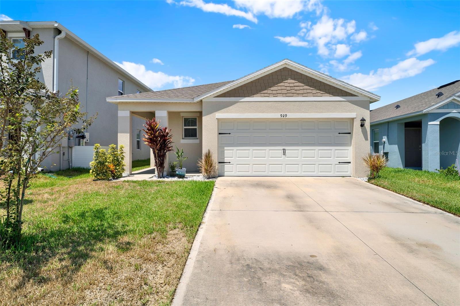 Wow! Perfect three-bedroom home, only two years old! You will fall in love with the beachy vibes of this Jemison model DR Horton home in Courtland Park. This location is ideal for people who want to be close to Osteen, Lake Mary, Sanford, and only 30 minutes from New Smyrna Beach. The layout is so functional for low-maintenance living. You have a two-car garage and spacious driveway to accommodate guests, a large inside laundry room with a window for natural light, and space to iron clothes. A wide foyer and hallway welcome you into the open layout kitchen and combination dining room and family room. The kitchen is an uplifting turquoise blue, reminiscent of the ocean on a sunny day at the beach. The modern gray cabinets feel fresh and provide a neutral base. There is beige carpet throughout the home, with the light blue walls evoking the feeling of blue skies and sandy shores. The large primary suite is in the rear of the house, providing the perfect place to recharge with easy breezy high ceilings and natural light. There is a walk-in closet, a walk-in shower, double vanities, and a private toilet in the primary ensuite. The second bedroom could be used as a home office, workout room, playroom, or studio. The third bedroom is in the front of the home with a large hall bathroom. Perfect for guests or children. Plenty of space in the backyard to play and enjoy being outside. A large covered patio provides space for outdoor dining or a patio furniture set. This home is move-in ready with low HOA ($93/month), no CDD fees, and energy-efficient appliances. Schedule your showing today and come fall in love. Let's make a deal!