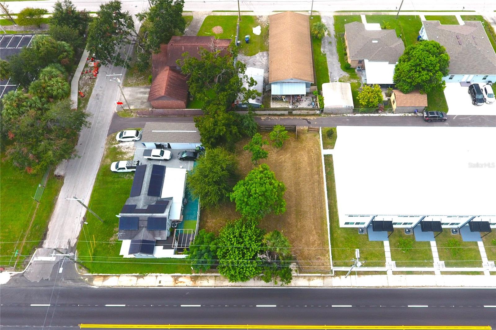 Fantastic opportunity to build in the heart of Tampa! This vacant lot at 2606 W Columbus Drive offers incredible potential with a central location just minutes from Midtown, Downtown, Tampa International Airport, shopping, dining, and major highways for convenient commuting. The surrounding area is booming with new development, including recently constructed townhomes, and the property sits on a street with established commercial properties, making it a strong candidate for residential or potential commercial use. The lot also features fruit trees, including mango and avocado, adding a touch of natural charm. With no HOA and no CDD, you’ll enjoy maximum flexibility in one of Tampa’s fastest-growing neighborhoods. Whether you’re a builder, investor, or future homeowner, this property is a rare find with endless possibilities. Click on the tour link attached to this listing for more details and visuals. Call today to schedule a showing!