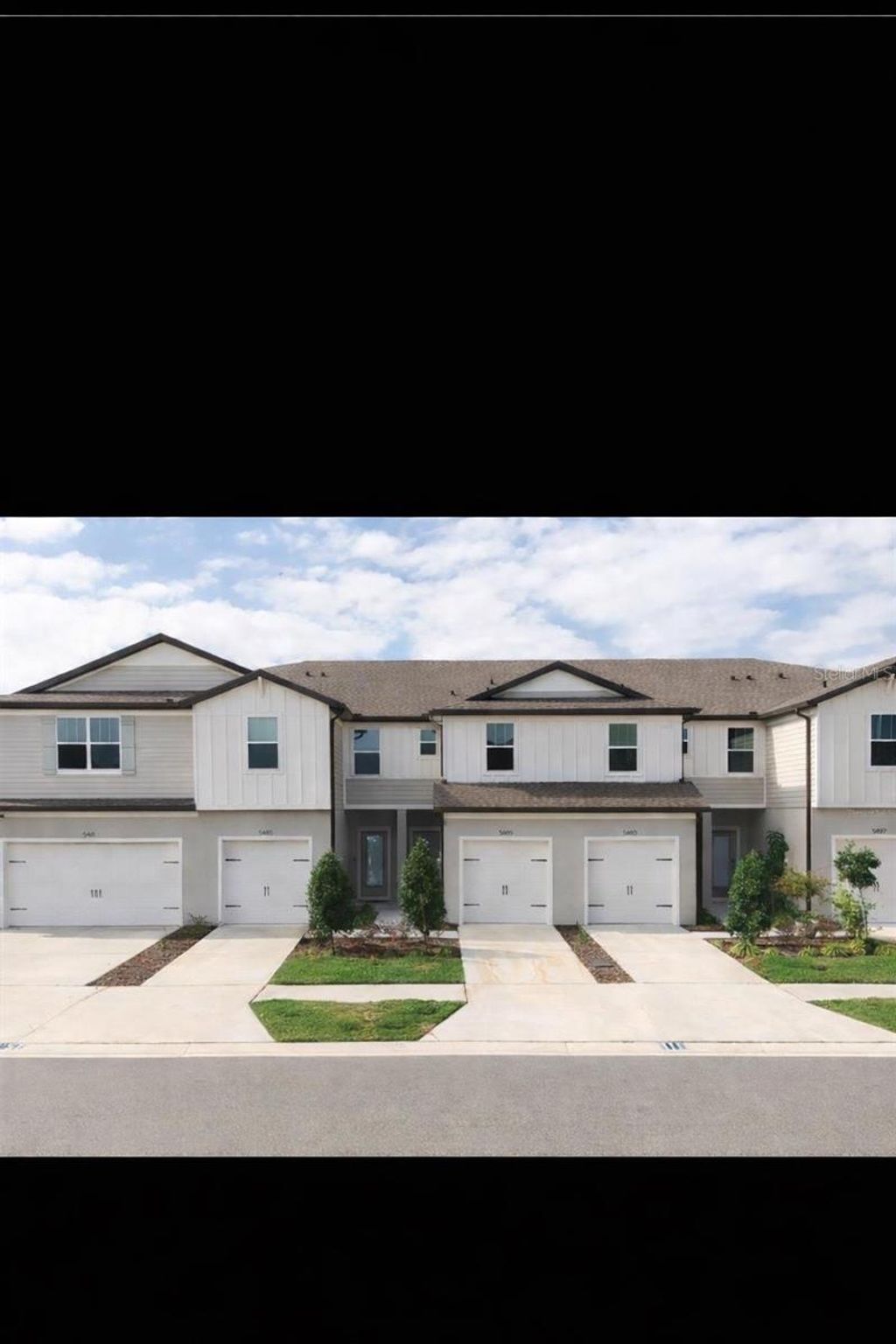 Photo of 5489 Elmview Crossing, Wesley Chapel, FL 33545 (MLS # TB8460325)