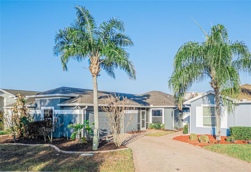 Welcome to easy, low-maintenance living in the highly sought-after 55+ gated community of Traditions in Winter Haven! This well-maintained 2-bedroom, 2-bath home offers 1,118 sq ft of comfortable living space with a 1-car garage and paved driveway. Major updates include a newer roof and AC system—both just 4 years old—providing peace of mind for years to come.

Inside, you’ll find a functional and inviting layout featuring stone countertops in the kitchen and bathrooms, along with tile flooring in all wet areas. The kitchen comes fully equipped with refrigerator, microwave, double oven with electric range, and dishwasher, while the washer and dryer are also included—making this home truly move-in ready.

Enjoy Florida living year-round with both a screened-in front porch and a screened rear porch, perfect for relaxing or entertaining. The privacy-fenced backyard provides a peaceful outdoor space rarely found in this community.

Traditions offers an active lifestyle with resort-style amenities including a clubhouse, fitness center, pool, tennis courts, dog park, and recreational facilities. Residents also enjoy access to community waterfront features such as a boat ramp, dock, fishing, and lake access. HOA fees include cable TV, internet, private road maintenance, recreational amenities, and professional management. Buyer approval is required.

Conveniently located near the new Publix under construction, with quick access to Hwy 27 and Hwy 60, and just minutes from Winter Haven’s Chain of Lakes, shopping, dining, and LEGOLAND.

Don’t miss your opportunity to enjoy the Florida lifestyle in one of the area’s premier 55+ communities—schedule your private showing today!