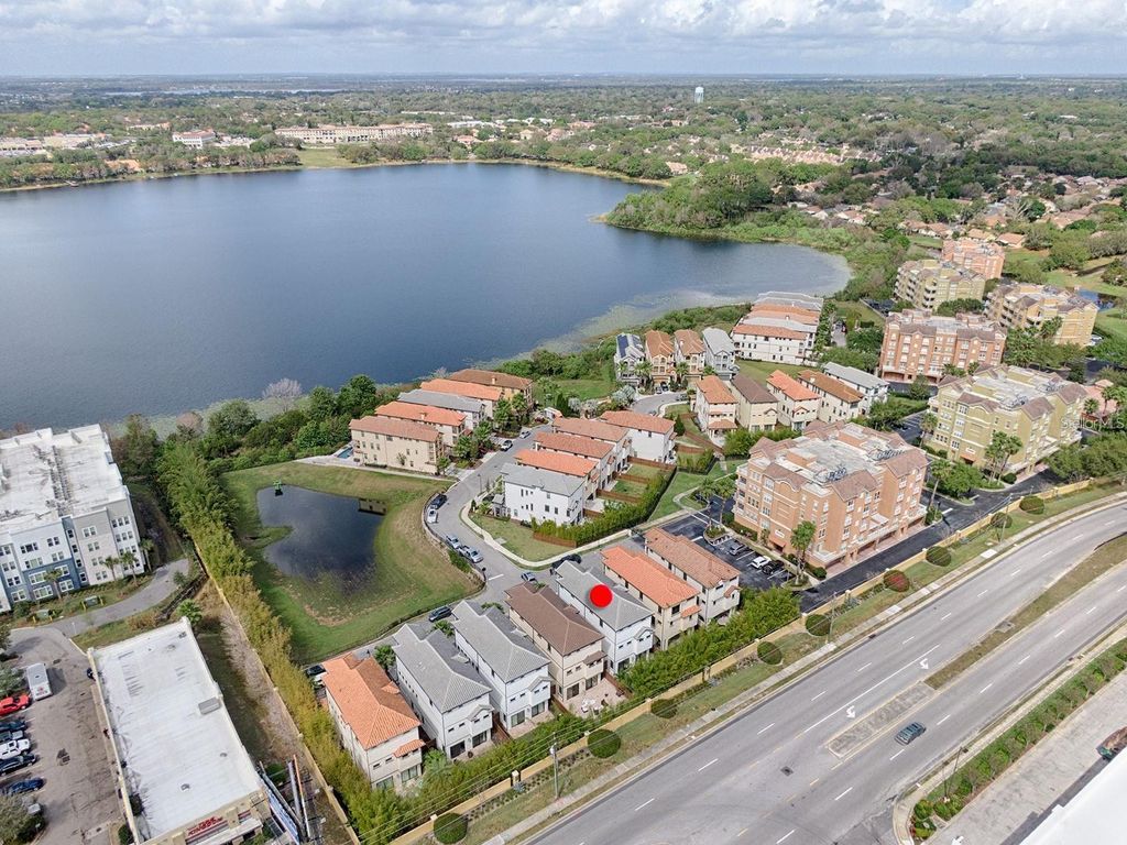 Photo of 7661 Toscana Boulevard, Orlando, FL 32819 (MLS # O6418841)
