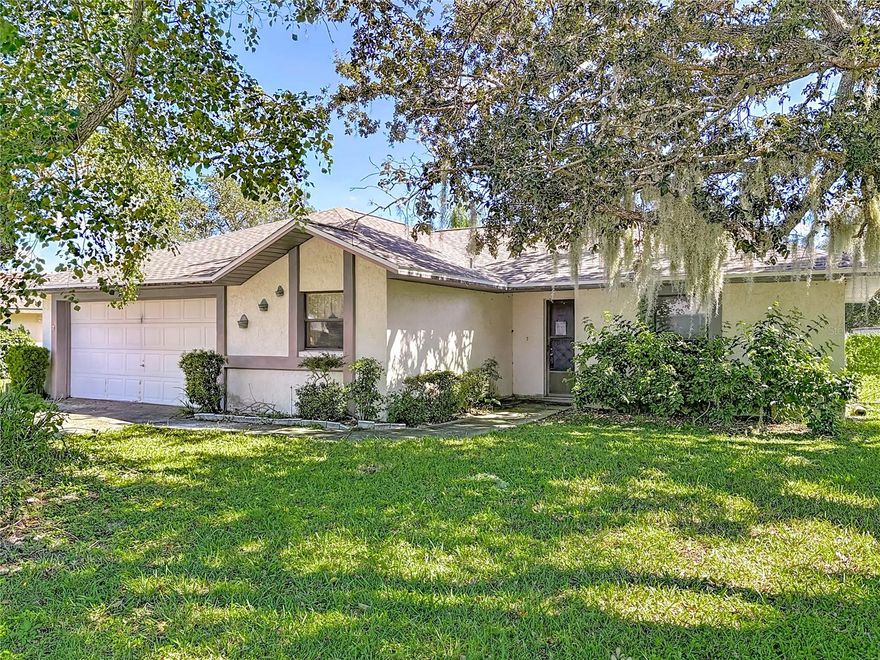 Seller says bring all offers. Solid concrete block construction with a brand-new roof already in place. This home offers 3 bedrooms, 2 bathrooms, and a 2-car garage on an approximately ¼-acre lot. The fenced backyard provides privacy and room to enjoy the outdoors. Interior needs updating, but the bones are strong and the layout offers great potential for renovation or investment. Don’t miss this opportunity to create value and make it your own!