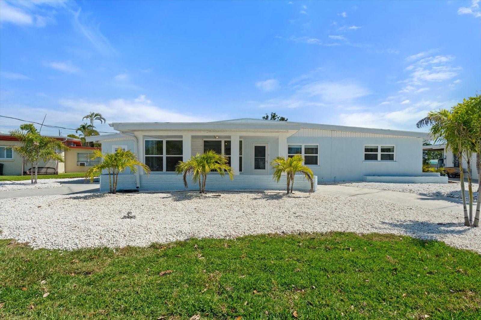 BIG PRICE DROP - NOW $579,000!
Don't miss this rare opportunity to own a waterfront home with direct Sarasota Bay access at one of
the best values in Manatee County!
WATERFRONT HOME WITH DIRECT SARASOTA BAY ACCESS - NO BRIDGES!
This beautifully updated 3-bedroom, 2-bathroom home is situated on the widest part of a saltwater
canal, offering direct, bridge-free access to Sarasota Bay-ideal for boating enthusiasts.
Inside, you'll find a fully remodeled kitchen with new appliances, updated bathrooms, and a
renovated primary suite, all designed with comfort and style in mind. Vaulted ceilings create an open
and airy atmosphere, while a newer roof and updated windows enhance the home's move-in-ready
appeal. Fresh landscaping and a refreshed front elevation boost curb appeal, and a separate
workshop and laundry room provide additional storage and functionality.
Located in the desirable Bayshore Gardens community, residents enjoy access to a Jr. Olympic-size
swimming pool with an expansive sundeck, a private marina and boat ramp, a fishing pier with
cleaning station, and numerous green spaces with picnic areas, a playground, and a ball field. The
community also features newly added pickleball courts and a beautifully renovated recreation hall
available for private events. Active social clubs, including the Yacht Club, Garden Club, and
Woodchoppers Club, foster a vibrant community atmosphere.
Bayshore Gardens is conveniently located between Sarasota and Bradenton, just minutes from local
shops, dining, cultural attractions, and approximately two miles from the Sarasota-Bradenton
International Airport.