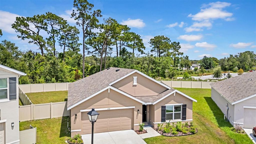 Photo of 11536 Timber Grove Lane, Brooksville, FL 34613 (MLS # TB8405047)