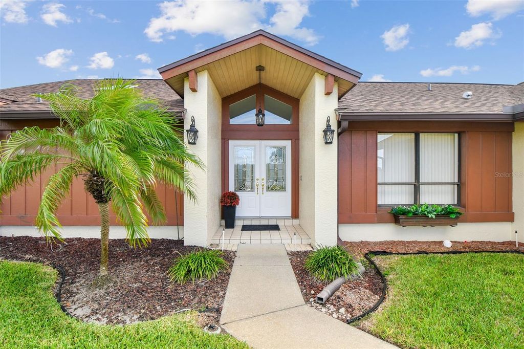 Photo of 1378 Rolling Ridge Road, Palm Harbor, FL 34683 (MLS # TB8436565)