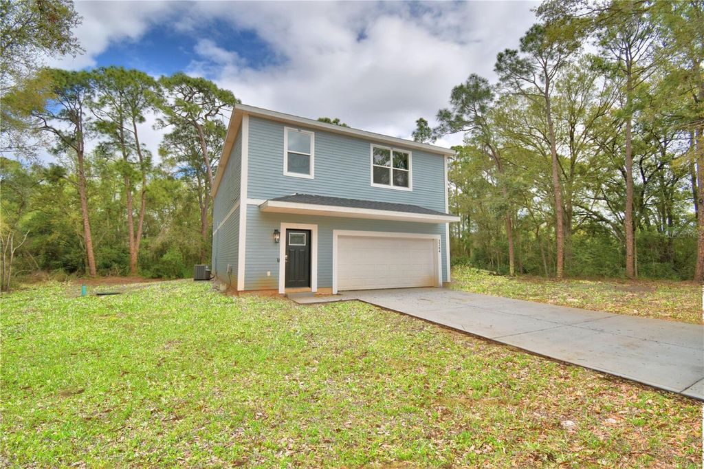 Photo of 2264 W Longbottom Road, Avon Park, FL 33825 (MLS # L4960438)