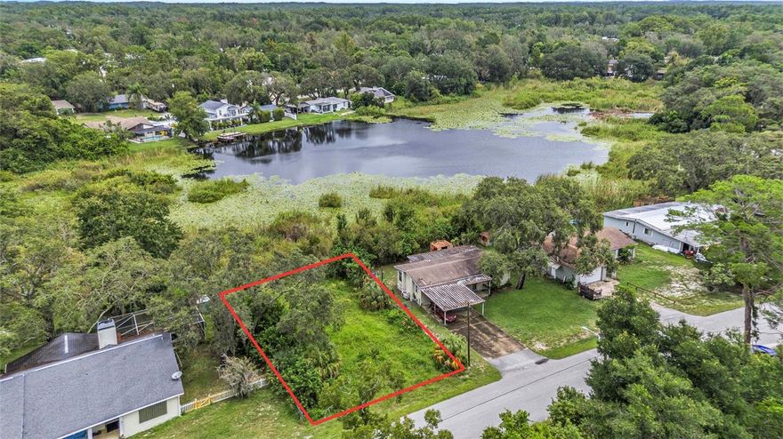 Affordable opportunity to own a 6,600 sq ft lakefront lot in Moon Lake Estates! Located on Clear Lake in New Port Richey, this residentially zoned property offers the perfect opportunity to create your own slice of Florida paradise - with no HOA restrictions. Enjoy peaceful waterfront views and the flexibility to design a home that fits your lifestyle. Conveniently situated just a short drive from downtown New Port Richey, you'll have easy access to local restaurants, breweries, boutiques, and entertainment. Spend weekends at Hudson Beach, explore nearby state parks, or take advantage of the many shopping centers and dining options just minutes away. Zoned for local schools and surrounded by nature, this lot offers the best of both serenity and accessibility. Don’t miss your chance to own prime lakefront property in a growing area - bring your vision and start building today!