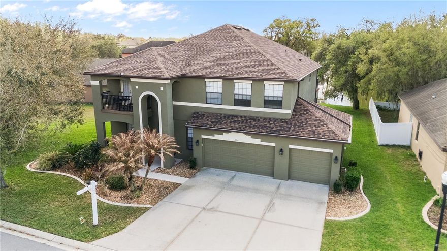 NEW LISTING! Welcome HOME Florida! Quality meets Quantity in this Expansive 4 Bed 3.5 Bath Home with almost 3600 sq feet sits on one of the LARGEST POND/ Bird Sanctuary FRONTAGE LOTS in this Gated Community of Oak Landing in MULBERRY, FL.   All of the UPGRADES throughout were added to this home at construction like  French doors, Solid  Maple Wood Cabinets/ Built in Range Hood, Granite Countertops, High Ceilings, Arched walls and Doorways, Balcony overlook and OPEN UPPER LEVEL Deck right off of the Game room/Billiard room,  Added 220 Volt Plug for an RV or Generator in the 3 CAR Garage.   Wonderful home for multigenerational LIVING with the 4 Spacious Bedrooms, 2 being set up like FULL Primary Suites!  The FULLY EQUIPPED THEATRE ( Reclining adjoined seating ensemble, BOSE Sound System, SHARP TV, MOVIE DECOR all Convey with an acceptable Offer) This Bonus Upstairs space, the OPEN FLOORPLAN, Kitchen and Family rooms, and BEAUTIFUL Formal Living and Dining rooms allow for ample room to spread out and yet find a nook of your own even while enjoying room to HOST family or friends in larger gathering spaces as well! Kitchen features A Massive breakfast Bar Island, Dining Nook, Closet Pantry storage, Glass front doors, any Chefs DREAM!!  Great VALUE for this neighborhood and all that it offers !! New Roof 2024, New AC -downstairs 3 years old. , Freshly Painted Exterior, New Sprinkler System 2025, New Gutters (2025) ONLY $160/ sq foot!!! Call to make your appointment to visit the home today!