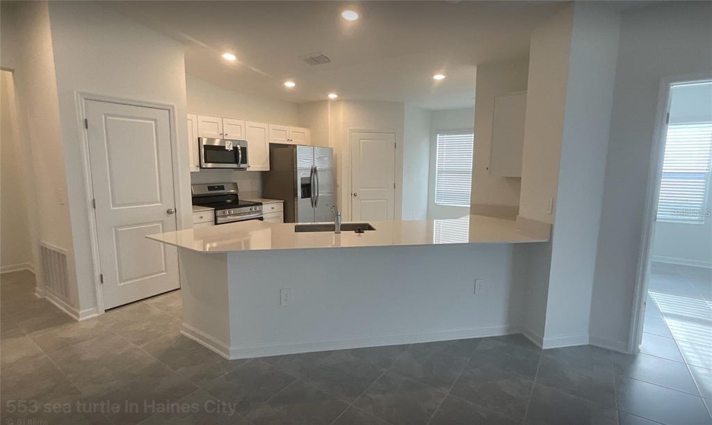 Photo of 553 Sea Turtle Ln, Haines City, FL 33844 (MLS # S5157474)