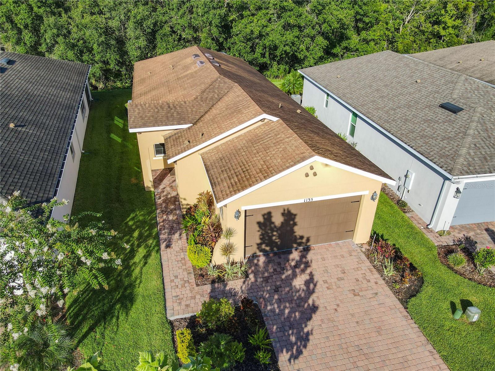 GREAT BOLZANO model built in 2016 on a CONSERVATION lot in the Mira Vista subdivision of Solivita. OPEN FLOOR PLAN! UPGRADES INCLUDE: 20" CERAMIC TILE in all main living areas with carpet in bedrooms. ENERGY EFFICIENT with DUAL PANE windows & slider. CULLIGAN Whole House WATER SOFTENER. Ceiling Fans in Living Room, Den, Bedrooms & Lanai. Kitchen boasts LG FINGERPRINT RESISTANT GRAPHITE STAINLESS STEEL appliances including a ThinQ FRENCH DOOR refrigerator & a SLIDE-IN range, QUARTZ counters, SUBWAY TILE backsplash, 42" upper cabinets, Pantry with WOODEN shelves, SINGLE BOWL DEEP SINK with REVERSE OSMOSIS and RECESSED lights. Primary Suite has WALK-IN & LINEN closets and its bathroom has a WALK-IN SHOWER with 2 shower heads & a bench. Both bathrooms have RAISED VANITIES, MANUFACTURED STONE counters, SOFT-CLOSE drawers & COMFORT HEIGHT commodes. Laundry Room has LG top-load washer & dryer and built-in cabinets. Two Car Garage floor is painted with EPOXY & CONFETTI CHIPS and has two OVERHEAD STORAGE RACKS and a pegboard. Lanai has PAVER flooring and is extended, partially covered & screened with private conservation views. Exterior was painted in 2023.
**See the FULL LENGTH VIDEO on Tour Link 1.** ***Solivita is an active adult 55+ community located in Kissimmee, Florida. It is approximately 50 minutes from Disney World & the Orlando International Airport. Solivita has a total of 5,470 homes. Approximately 10,000 - 11,000 people live in Solivita during the winter while approximately 7,500 live in Solivita during the summer. Enjoy your active years in this piece of paradise. Solivita's amenities include: - a manicured SOFTBALL diamond & field - 36 holes of CHAMPIONSHIP GOLF that can be played by joining the Stonegate Golf Club or paying as you go - 2 STATE of the Art AMENITY centers with updated exercise equipment, yoga studio & meeting rooms - 3 restaurants - 14 HEATED POOLS - 17 PICKLEBALL courts - 9 TENNIS courts - 4 BOCCE BALL courts - 4 SHUFFLEBOARD courts - 3 HORSESHOE pits - a BILLIARDS room - miles of bike paths - 2 DOG PARKS (Small & Large Dogs) - Corn Hole - Tot Lot PLAYGROUND - COMMUNITY GARDEN - over 250 resident clubs. The HOA: - maintains the LANDSCAPING & IRRIGATION systems in the common areas as well as at individual homesites - maintains the roads throughout the community - PROVIDES SECURITY with gate guards and mobile patrols including the Polk County Sheriff - allows AUTOMATED GATE ACCESS for residents via license plate readers - provides residents with Fiber Optic Internet & TV service.***Poinciana Lakes Plaza is a MAJOR NEW SHOPPING CENTER that opened directly across from the Solivita Main Gate in Summer of 2024. It features Sprouts Grocery, TJ MAXX, Ross, Burlington, Rack Room Shoes, 5 Below, Ulta, Outback, First Watch, 5 Guys, Urgent Care, Dentist, TD Bank, Petco & Hair Cuttery PLUS MORE TO COME.***
