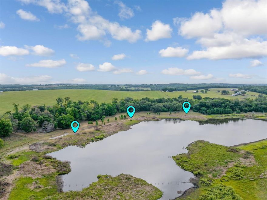 How about Owner Financing on this beautiful 22.5 MOL acres on Lake Harrison offering the ability to divide into three separate lots!! Less than $30K an acre! Whether you’re looking to build your dream home in Dade City or create a private three-home family compound, this exceptional property provides endless possibilities. Set along the peaceful shores of Lake Harrison, the land features towering mature trees, expansive open space, and serene lake views that create a truly picturesque setting. The generous acreage allows for privacy and flexibility—perfect for a private retreat, or Equestrian Estate. Enjoy the tranquility of lakefront living while remaining just minutes from historic downtown Dade City, local dining, and convenient access to I-75 and the Suncoast Parkway. Property consists of three separate lots being sold together. Lake frontage measurements are approximate.