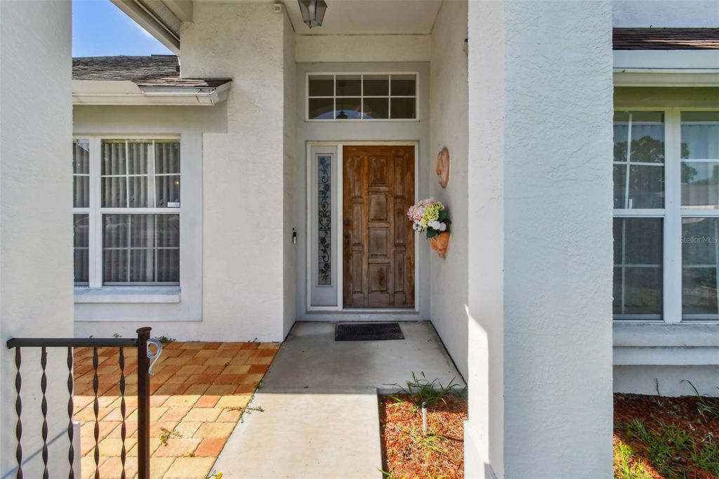 Photo of 821 Walsingham Way, Valrico, FL 33594 (MLS # TB8412585)