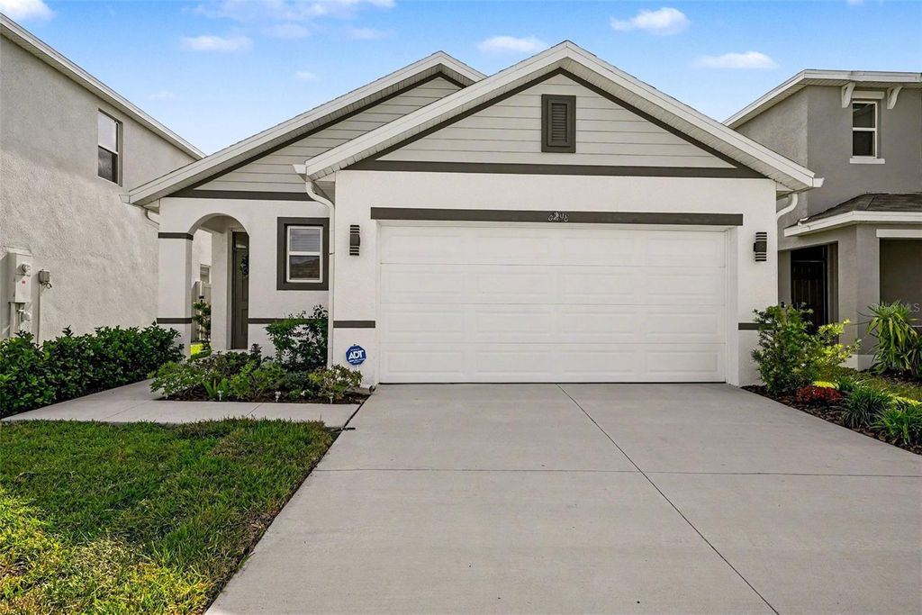 Photo of 6298 Wandering Willow Drive, Wesley Chapel, FL 33545 (MLS # TB8496581)