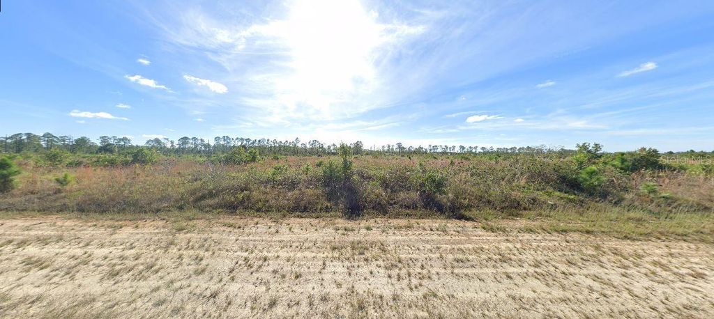 Photo of 411 Portulaca Drive, Indian Lake Estates, FL 33855 (MLS # O6229438)