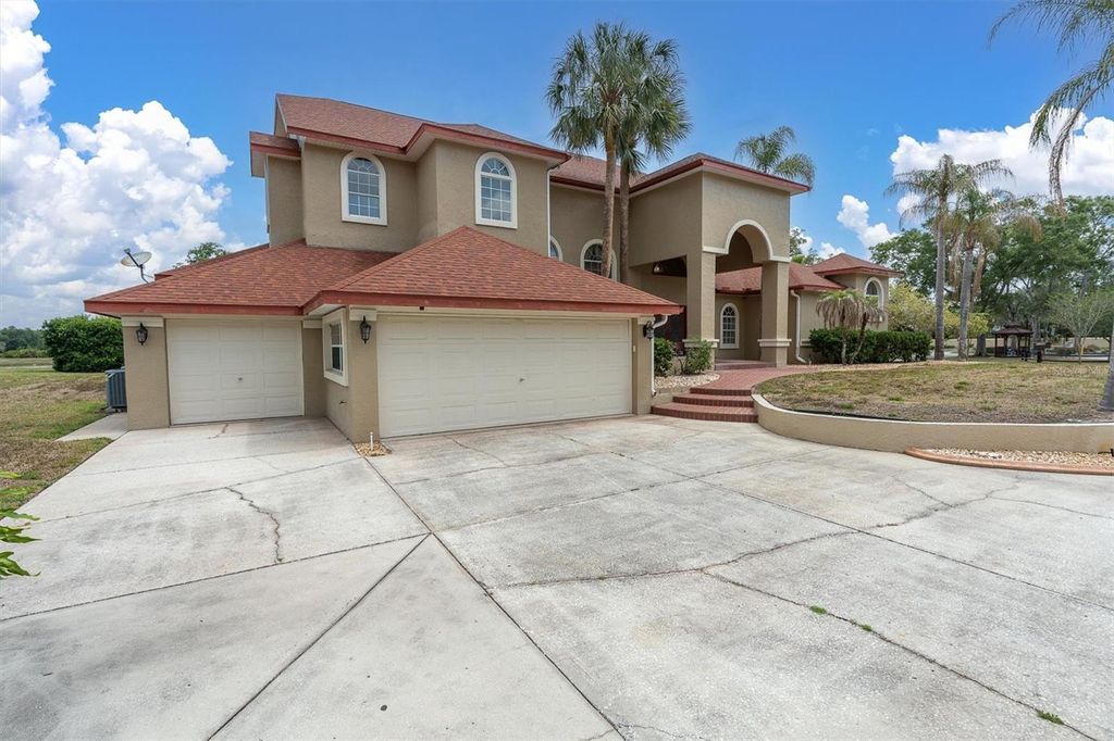 Photo of 4404 Lake In The Woods Drive, Spring Hill, FL 34607 (MLS # TB8504398)