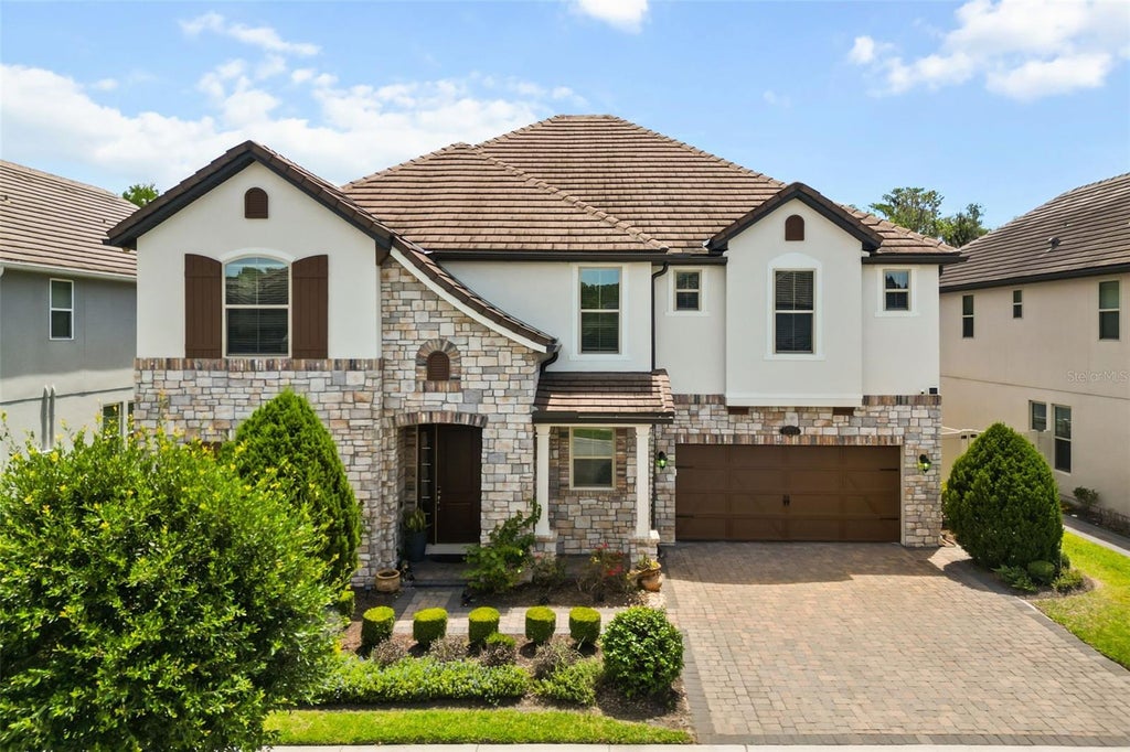 Photo of 10713 Belle Maisons Drive, Orlando, FL 32832 (MLS # O6415409)