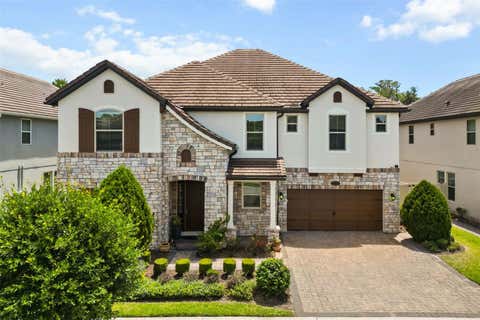 Photo of 10713 Belle Maisons Drive, Orlando, FL 32832 (MLS # O6415409)