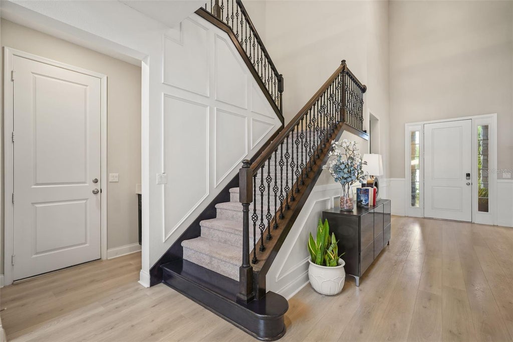 Photo of 10713 Belle Maisons Drive, Orlando, FL 32832 (MLS # O6415409)