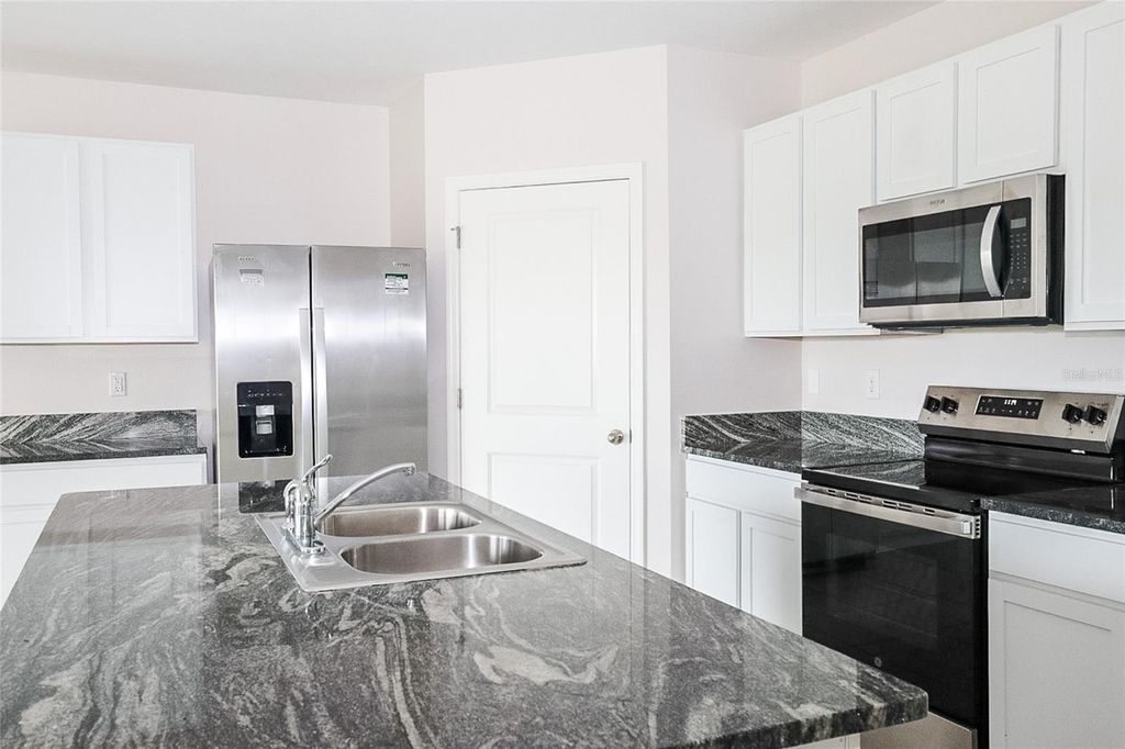 Photo of 34029 Sorrel Mint Drive, Wesley Chapel, FL 33543 (MLS # TB8445602)