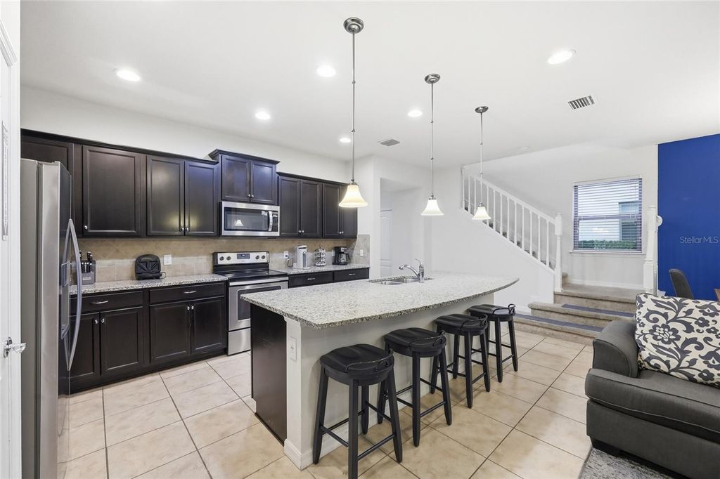 Photo of 8851 Geneve Court, Kissimmee, FL 34747 (MLS # O6370265)