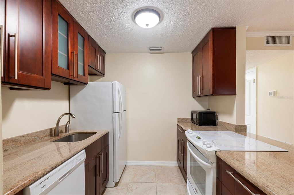 Real estate matching your search 68 Photo of 1710 Belleair Forest Drive #D, Belleair, FL 33756 (MLS # TB8441418)