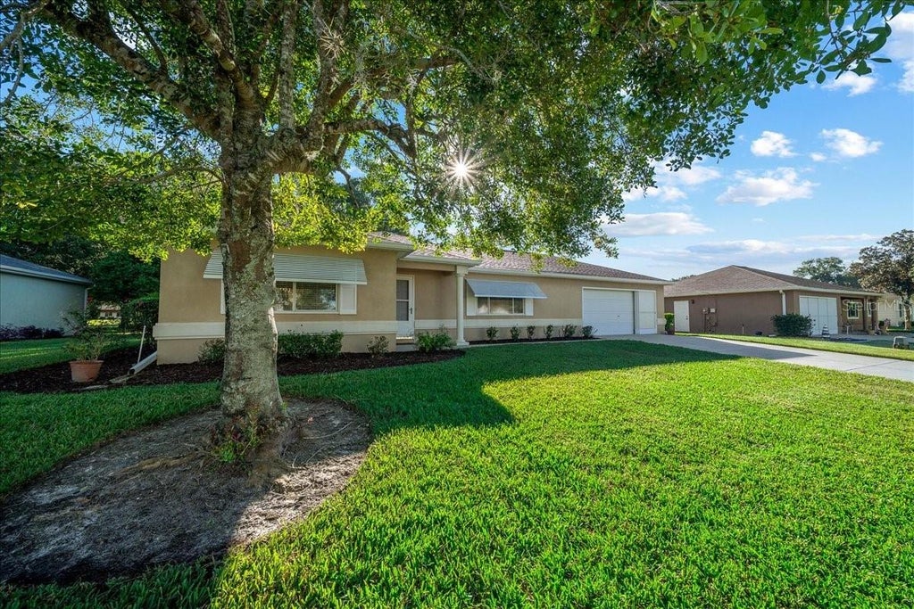Photo of 13885 SW 112th Circle, Dunnellon, FL 34432 (MLS # OM733957)