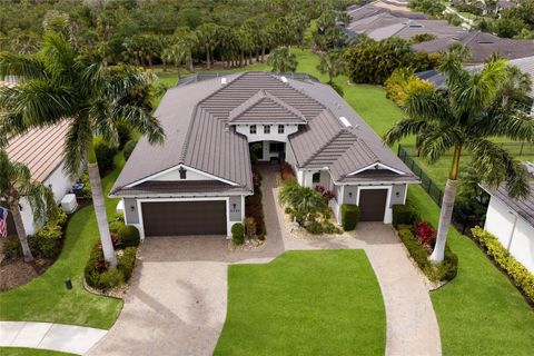 Photo of 5709 Tidewater Preserve Boulevard, Bradenton, FL 34208 (MLS # A4688994)