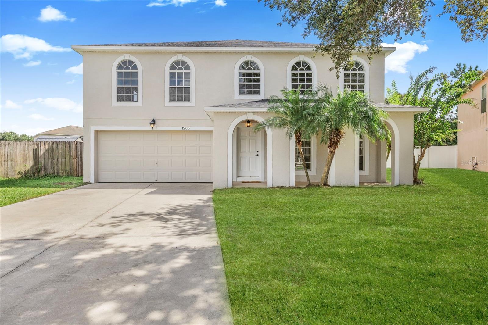 One or more photo(s) has been virtually staged. This stunningly updated home checks all the boxes with MAJOR UPGRADES throughout!!! A BRAND-NEW Roof (Agus 225), two newer AC units (1 August 2025 and the other from 2023), and a new water heater give you peace of mind for years to come! The outside of the home has been freshly painted a lovely neutral color, step inside to find a completely freshly painted interior in a neutral white throughout, complimented by a lovely vinyl plank flooring - making cleans ups a breeze! The GORGEOUS UPDATED kitchen features white shaker style cabinetry, new fixtures, quartz countertops, BRAND NEW kitchen appliances, a huge central island - perfect for prepping for dinners or entertaining and a lovely updated light fixture. The kitchen also has a huge walk in pantry and a window over the sik looking out to the backyard. The bright an open floor plan includes a conveneint indoor laundry closet and a flexible upstairs loft that can serve as an office, teen retreat, or hobby space. The spacious Primary Suite is a true retreat with two walk-in closets, abundant natural light from several windows, and a spa-like ensuite bath with dual sinks, a soaking tub, separate shower and a private water closet. There are 3 additional bedrooms on the second floor - one has a a large walk in closet and a private bathroom attached while the other 2 generously sized bedrooms share the hall bathroom. Enjoy outdoor living on the back patio, ideal for cookouts, while the huge backyard offers plenty of room to play, garden, or relax. A 2-car garage copletes this fantastic home. With all the updates done, and the ability to close quickly, this home is truly move-in ready!