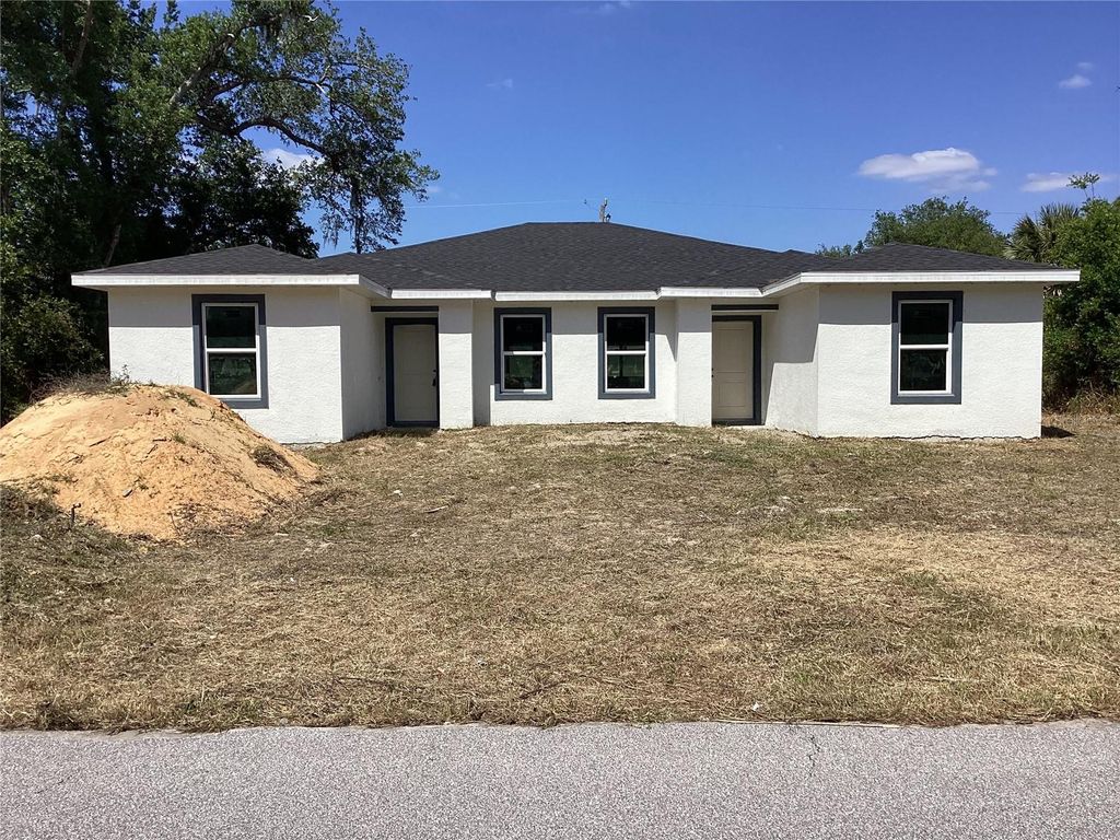 Photo of 382 Bamboo Drive, Port Charlotte, FL 33954 (MLS # A4692196)