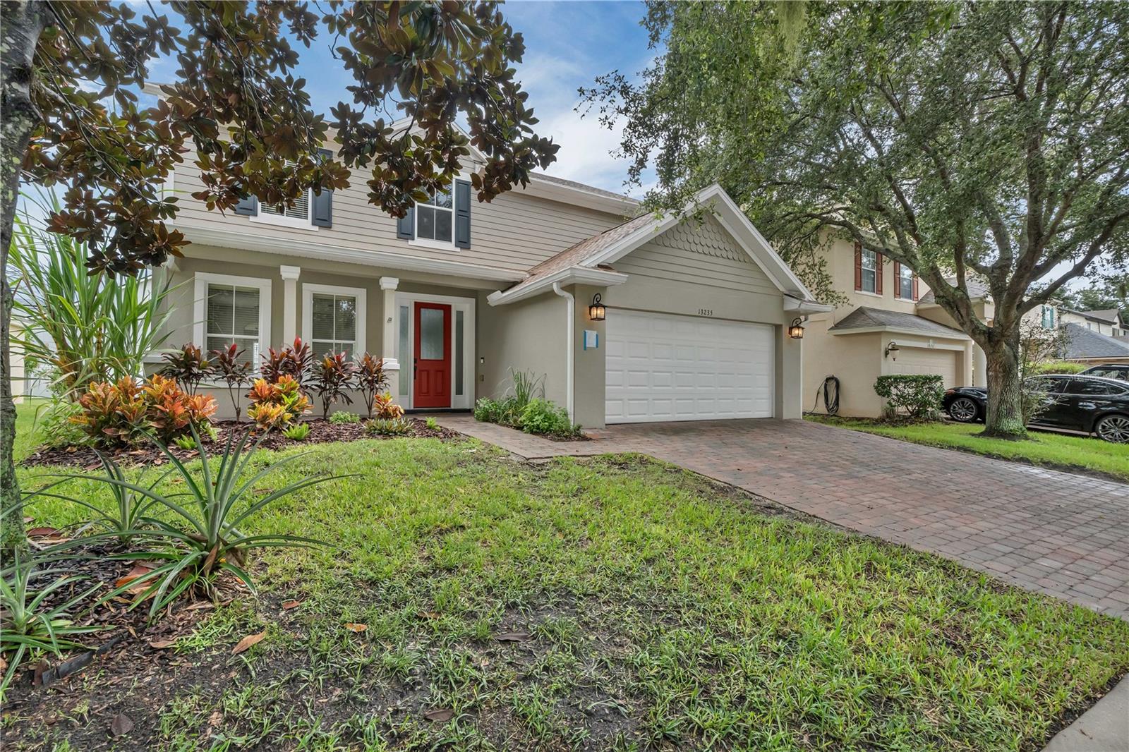 Welcome to your new home! Located in the highly desired Audubon certified Eagle Creek Gated Golf Community in Lake Nona. This home offers a new July 2025 roof, 2024 Hot Water Heater, and 2021 HVAC, so the big items have been updated! The entrance will take your breath away as you take in the open space concept and vaulted ceilings. New luxury vinyl flooring throughout the main floor. The kitchen offers newly painted 42” wood cabinets and granite countertops. Plenty of natural light throughout. Master Bedroom located in the first floor and the Master Bath offers quartz vanity, frameless shower, and porcelain tile. Upstairs you will enjoy 4 bedrooms with new carpet, 2 bath and a bonus room completing the space you and your family has been looking for. Eagle Creek is located in the heart of Lake Nona and offers the lifestyle you deserve with it 24 hour guarded gated entry, two pools, clubhouse with restaurant, fitness center, tennis & basketball courts, bicycle and walking trail, all surrounded by the certified golf course. Location has plenty of perks with short distance to shopping centers, restaurants, hospitals, airport and surrounding cities with multiple expressway options (SR 417) (SR 528). Come tour today