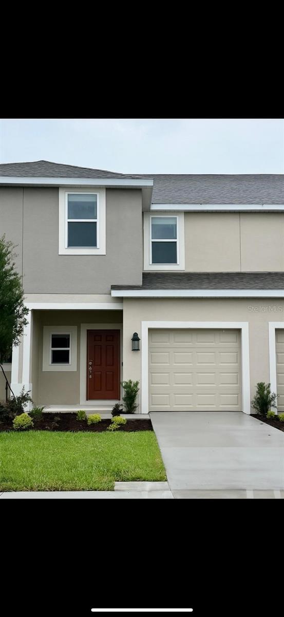 Newly Built! This stunning townhome in the desirable Anthem Park community of St. Cloud features three spacious bedrooms, two and a half bathrooms, and a beautifully designed kitchen with an oversized quartz island, complete with all appliances. Enjoy the added luxury of a large lanai, a one-car garage, and ample parking with a driveway and nearby public spaces. Perfectly situated close to major shopping centers and highways, this home offers unmatched convenience. Don’t miss this exceptional opportunity!