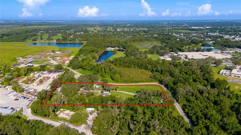 Photo of 1318 Neely Drive, Leesburg, FL 34748 (MLS # TB8416432)