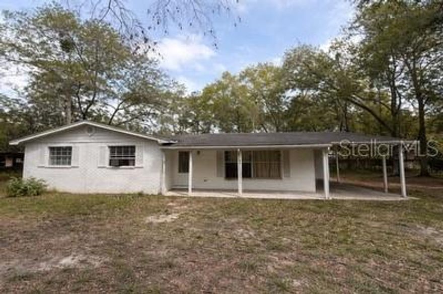 Great investment opportunity with land and potential in Brooksville! This 4-bedroom, 2-bath home offers 1,172 sq ft of living space and sits on an oversized 24,000 sq ft lot, plus an additional 4,017 sq ft parcel included in the sale for added value and flexibility. Located just 5 minutes from Downtown Brooksville, this property offers convenience while still enjoying the space and feel of county living. Situated in the county limits, the current owners have had horses on the property, making this a unique opportunity for buyers looking for extra room and versatility. Whether you're an investor, renovator, or buyer with a vision, this property offers plenty of potential. Buyer to verify all measurements, zoning, land use, animal use, and intended use. Existing horse stable on the property is excluded from the sale and does not convey.