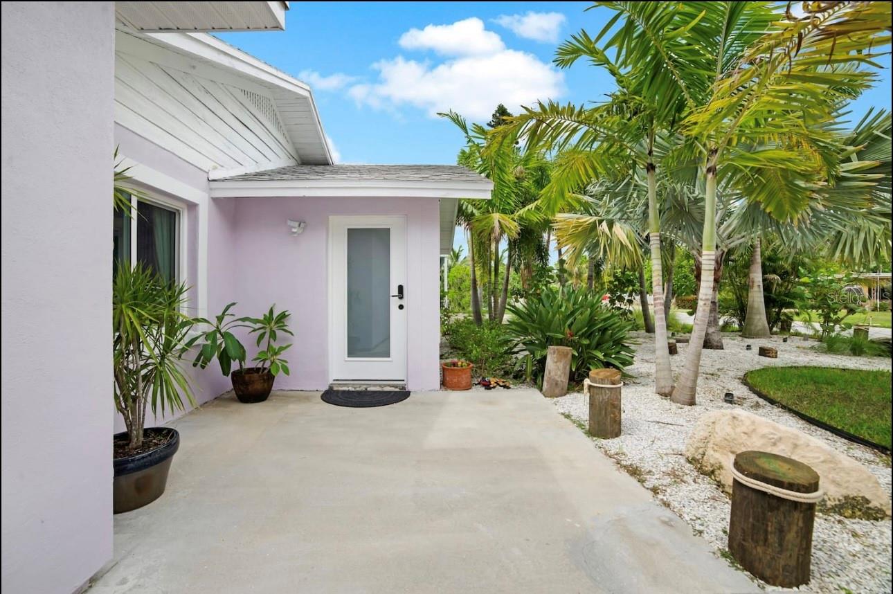 Escape to paradise in this stunning 3-bedroom, 2-bathroom beach house, perfectly situated in the tranquil coastal community of Indian Rocks Beach. As you step inside, you'll be greeted by the warm and inviting atmosphere of this beautifully designed home. The open-concept living area features large hurricane proof windows and hurricane proof entrance door and backyard door, allowing natural light to pour in and showcasing breathtaking views of the surrounding landscape. The kitchen is a culinary dream, equipped with modern appliances, ample counter space, and a spacious dining area best suited for entertaining. Three generously sized bedrooms offer serene retreats, each with plenty of natural light and comfortable living spaces. Two stylish bathrooms provide the perfect blend of form and function, complete with modern fixtures and luxurious finishes. But the true pièce de résistance is the exterior oasis. Lush, tropical landscaping surrounds the property, complete with vibrant flowers, swaying palms, and a tranquil water feature. The expansive outdoor living area beckons you to relax and unwind, with plenty of space for alfresco dining, sunbathing, or simply enjoying the salty sea air. Additional features of this incredible beach house include: - Private patio and outdoor living area - Lush, tropical landscaping - Modern kitchen with stainless steel appliances - Spacious bedrooms with ample natural light - Two stylish bathrooms with modern fixtures - Plenty of storage space throughout.