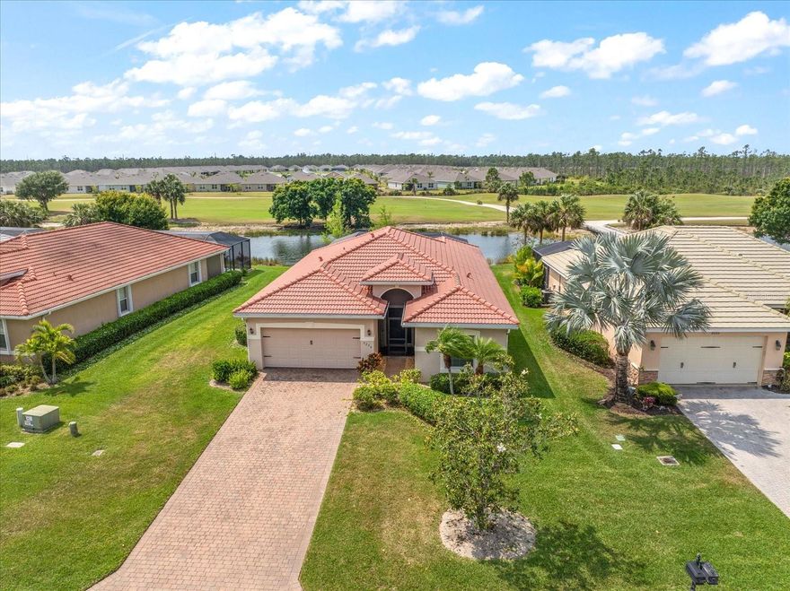 This home has the perfect blend of both comfort and convenience for seasonal or year round living. From the welcoming tasteful decor, to the primary suite with separate shower and soaking tub to the pool overlooking the water... relaxation is a breeze. If you're up for entertaining, then the sizable kitchen w/granite counters open to the family room and dining area would be perfect for inside gatherings, while the refreshing pool encompassed by the beautifully tiled lanai with spacious sitting areas would be ideal for outdoor events! 

In any case, this one is a must see!  The location within the community is perfectly situated between the main amenities near the entrance and the golf course to the far back.  Magnolia Landing itself offers resort-style living with multiple pools, a fitness center, pickleball, bocce ball, shuffleboard, and a calendar full of activities!