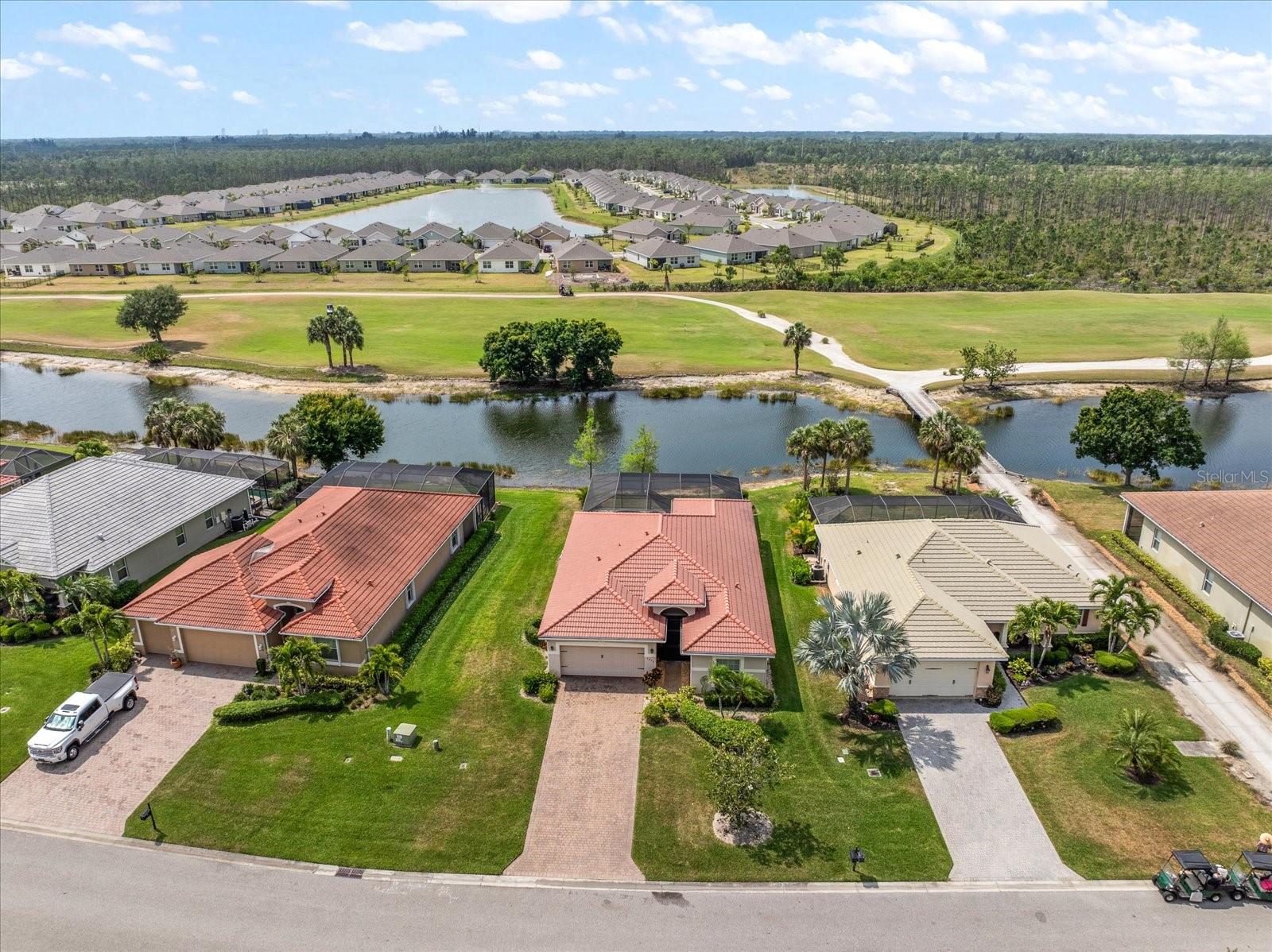 This home has the perfect blend of both comfort and convenience for seasonal or year round living. From the welcoming tasteful decor, to the primary suite with separate shower and soaking tub to the pool overlooking the water... relaxation is a breeze. If you're up for entertaining, then the sizable kitchen w/granite counters open to the family room and dining area would be perfect for inside gatherings, while the refreshing pool encompassed by the beautifully tiled lanai with spacious sitting areas would be ideal for outdoor events!
In any case, this one is a must see! The location within the community is perfectly situated between the main amenities near the entrance and the golf course to the far back. Magnolia Landing itself offers resort-style living with multiple pools, a fitness center, pickleball, bocce ball, shuffleboard, and a calendar full of activities!