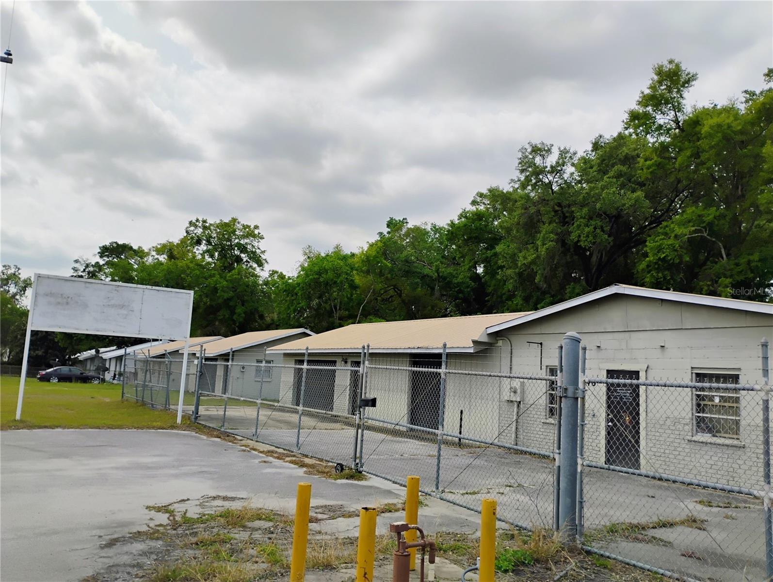 B-4 commercial warehouse/mixed use opportunity in Ocala. This property has 3 separate buildings, which consists of a residential (2/1), garage (24'x24') and the main warehouse (2,355 sq. ft.). Each building has its own address. The garage & warehouse does not have air or heat. The warehouse has a small leak in the roof behind the sales counter. The septic system was installed in 2019. 3 phase high-leg, compressed outlets through but in warehouse (compressor on premises, may be inoperable? Will not warranty). With B-4 Zoning & the 3 buildings. There are many ways this property can be utilized. See attached information from the City of Ocala Zoning department.