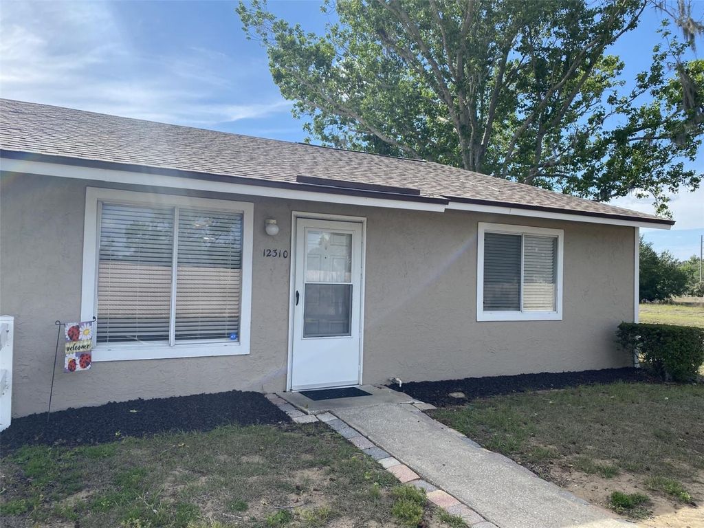 Photo of 12310 Tavares Ridge Court #144, Tavares, FL 32778 (MLS # G5111309)