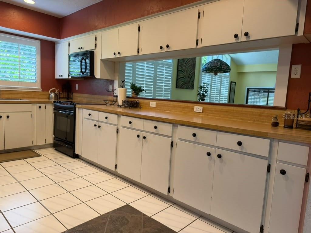 Photo of 107 Canterbury Drive, Haines City, FL 33844 (MLS # O6447214)
