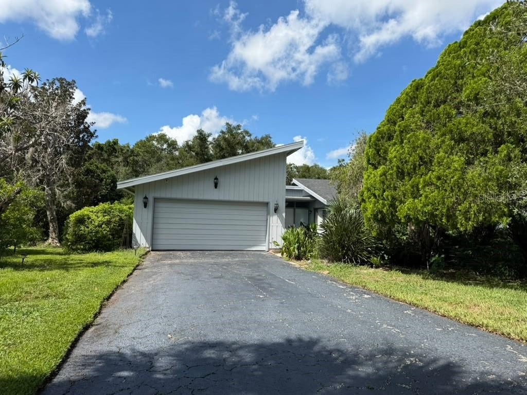 Photo of 107 Canterbury Drive, Haines City, FL 33844 (MLS # O6447214)