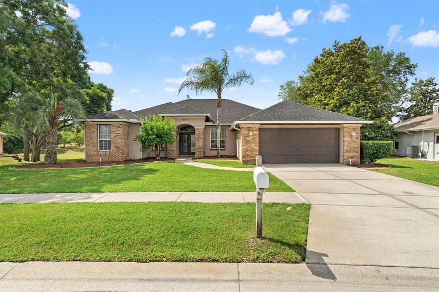 Step into this exceptionally maintained home where comfort, style, and thoughtful upgrades come together seamlessly. From the moment you enter, you’ll appreciate the elegant tray ceilings, beautiful luxury vinyl plank flooring (2020), and the spacious open layout featuring a great room, formal dining area, and desirable split-bedroom floor plan. The oversized owner’s suite offers a private sitting area and direct access to the sparkling pool, creating the perfect retreat. Outside, the screened lanai and pool area provide exceptional privacy — ideal for relaxing poolside, enjoying nature, or watching your favorite show on the outdoor TV. The pool also features a convenient self-cleaning system for easy maintenance. This home is loaded with premium upgrades and smart-home features, including a new roof (2022), new pool pump (2024), interior paint (2025), and outdoor Govee professional lighting (2026). Enjoy peace of mind with a Generac whole-house generator paired with a 500-gallon gas tank, Svenn outdoor security cameras, Ring doorbell camera, Nest thermostat, weather station, and Wi-Fi-enabled sprinkler controller (2025). Additional enhancements include:- Whole-house water softener and reverse osmosis filtration system, Garage mini-split A/C unit, UC anti-bacterial light in A/C system, Two roof solar fans, Commercial-grade 5” gutters, R21 attic insulation above garage, Sonos speakers in the lanai, Cost-effective irrigation well with new well pump.  This exceptional property combines luxury, functionality, privacy, and energy-conscious living — all designed for effortless Florida living.