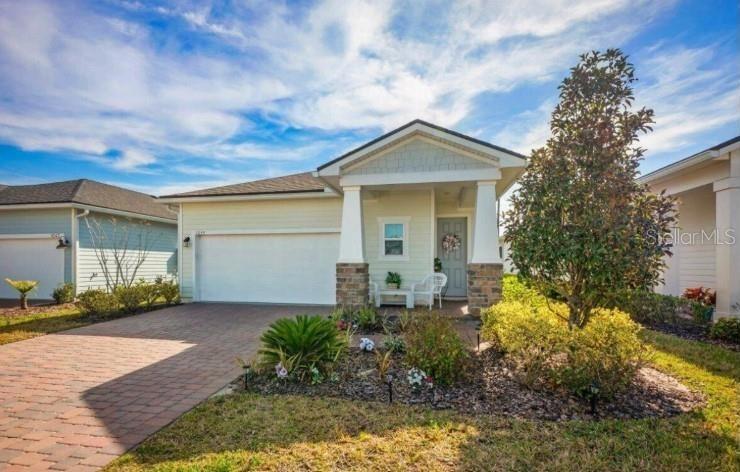 Exceptional opportunity to ASSUME an FHA LOAN at an incredibly LOW 2.375 interest rate. Welcome to this immaculate Blairmore model, featuring 2 bedrooms and 2 bathrooms, located in the highly sought-after 55+ community of Reverie at Trailmark. This like-new residence offers a perfect blend of modern design, thoughtful upgrades, and low-maintenance living.
Inside, you'll find an open-concept layout enhanced by neutral tones and stylish finishes throughout. The centrally located kitchen showcases high-end quartz countertops, upgraded cabinetry with designer hardware, a custom tile backsplash, and premium lighting. Luxury vinyl plank flooring flows seamlessly through the main living areas and primary suite, while the guest bedroom offers plush carpeting. The primary suite boasts a custom-designed walk-in closet and a beautifully appointed en-suite bath with quartz countertops. The guest bathroom is equally refined, featuring a fully tiled tub and shower surround. Additional enhancements include upgraded ceiling fans and lighting fixtures, as well as gutters—an upgrade not included in new builds. Step outside to a covered lanai overlooking a fully fenced backyard with iron rod fencing, ideal for relaxing or entertaining in privacy.
Reverie at TrailMark is a thoughtfully designed 55+ active adult neighborhood nestled within the larger, master-planned community of TrailMark. This unique setting offers the perfect opportunity for multi-generational living-where you can be part of a vibrant adult-focused lifestyle while still staying connected to family and friends of all ages just moments away. Within Reverie's private, gated neighborhood, you'll enjoy low-maintenance homes, resort-style amenities, and a calendar full of social events tailored to active adults. Whether you're joining a yoga class, relaxing poolside, or gathering around the fire pit, every day is built around connection, wellness, and fun. Residents of Reverie enjoy amenities including a 4,600-square-foot lakeside clubhouse, indoor and outdoor social spaces, six tournament-class pickleball courts, an amazing fitness center that has separate aerobic rooms and weight rooms, resort-style pools heated all year and spa, bocce ball and additional sports courts, food truck pavilion, dog park, canoe launches, scenic trails, and full access to all Trailmark community amenities thats expands your lifestyle even further with miles of nature trails, kayak launches, community parks and planned activities with directors including beer garden for special outdoor events.
It's all surrounded by the natural beauty of St. Johns County, just a short drive to historic St. Augustine and the beaches beyond. At Reverie at TrailMark, you can live the active adult lifestyle you've been looking for-without giving up the moments that matter most. It's a smart move for your next chapter, schedule your showing today!