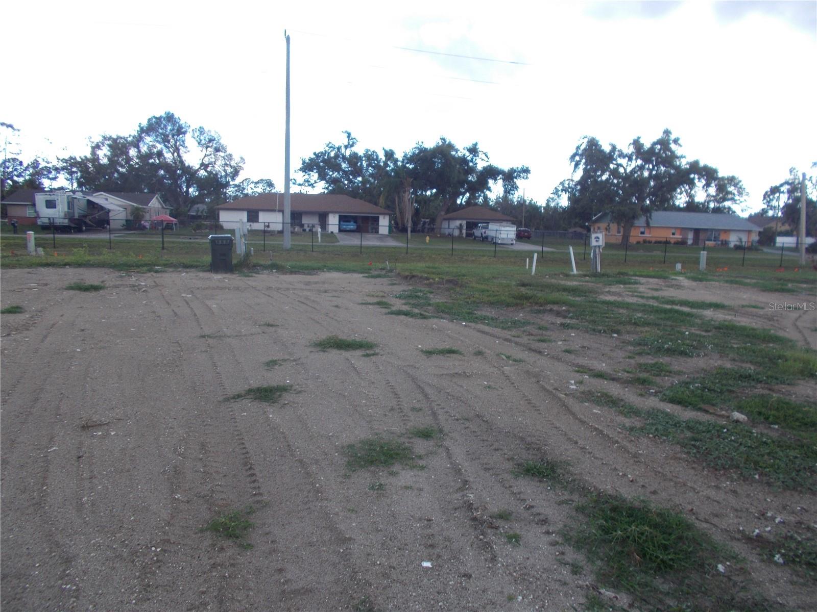 VACANT LAND in sought after 55+ Gated Community of Holiday Park and in the PET SECTION. The land is located on Palena Blvd. and is backed by Chancellor Blvd. The double-wide mobile home has been removed from the property and is vacant land. Water meter remains. In Holiday Park you own the land with a deed and the Maintenance fee of $2340.00 a year ($195.00 a month) is included in your taxes. Holiday Park offers many amenities including 2 Pools, Tennis Courts, Pickle Ball, Bocci, Shuffleboard, Laundry, Library Horseshoes, Bingo plus other card games, Fitness Room and so much more. This is a perfect place for your new manufactured home. Come and see!