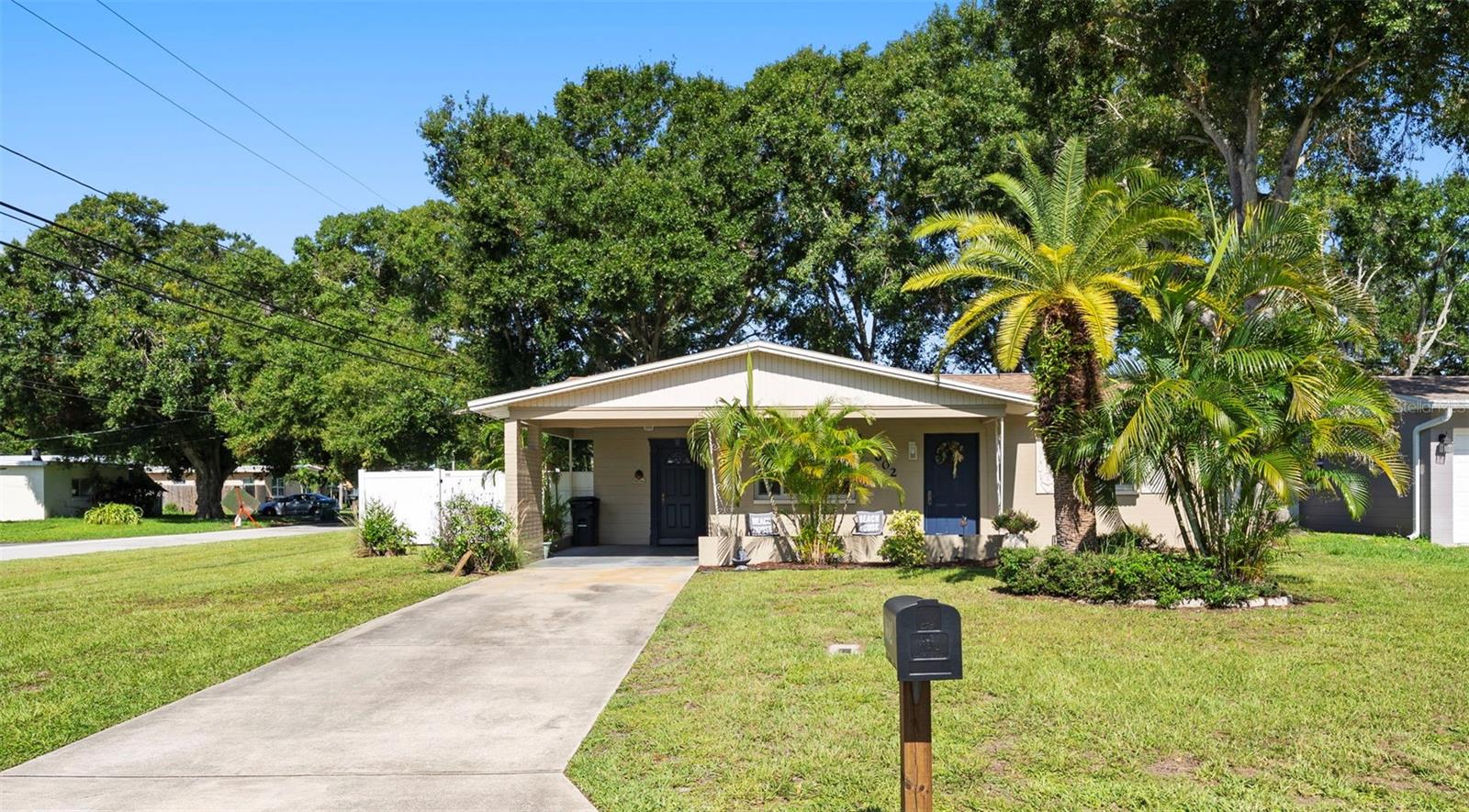Welcome Home! Endless potential awaits in this charming, lovingly maintained 2-bedroom, 2-bathroom solid block home nestled on a spacious corner lot in a quiet, friendly neighborhood. Step inside and be greeted by vintage charm—original terrazzo floors and a delightful retro-style kitchen that bring character and warmth to the space. While much of the home retains its classic appeal, thoughtful updates over the years have added comfort and convenience, including a brand new electrical panel (2025) and a newer A/C unit (2022). The home's sun-filled Florida room, perfectly placed off the dining area, invites you to relax with your morning coffee or wind down with evening meals—all while enjoying views of your expansive, fully fenced backyard. Whether you're dreaming of a pool, garden oasis, or space to entertain, there's plenty of room to create your ideal outdoor retreat. Plus, the corner lot offers ample room for secure parking—ideal for a boat, trailer, or other recreational toys. A detached shed provides extra storage for tools, lawn gear, or hobby equipment, helping you keep everything neat and accessible. Perfectly positioned close to Lake Seminole and minutes aways from top-rated schools, parks, Seminole City Center, and of course, the stunning Gulf beaches, this home combines peaceful living with unbeatable convenience. Best of all—no HOA or CDD fees, giving you the freedom to personalize and invest without the added costs. Don’t miss this unique opportunity to own a home that’s full of charm, solidly built, and ready for your personal touch. Schedule your private showing today and imagine the possibilities!
