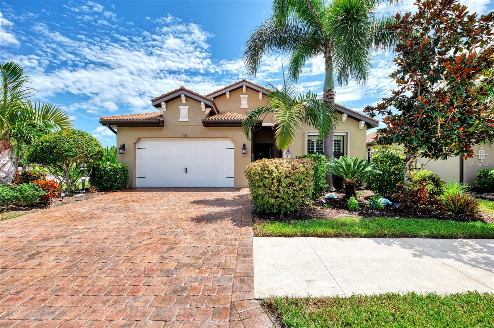 Location! Location! and Location! NOT IN A FEMA SPECIAL HAZARD FLOOD ZONE! Community has NEVER Flooded! Right Next to Legacy Trail! And across from community heated pool! This Top Selling Edison Home Plan is DR Horton Best Selling Floor Plan! The 3 Bedroom, 2 Bathroom with den, is tastefully upgraded! From the minute you walk in 8' Entry Door to the Double Tray Ceilings in Foyer you recognize that you want this home! Kitchen offers Bosch Appliances, and GE Profile Refrigerator, Level 5 Wood Cabinets with Mocha Glazing, Cambria Quartz Countertops and upgraded backsplash. Open floor plan is perfect for all your entertaining needs, The Primary Bedroom is spacious light and bright with two walk in closets. The Primary Bathroom offers his and hers sinks with Soaking Tub and Walk-In Shower along with a private water closet. The guest bedrooms and guest bath is on opposite side of home for total privacy. Both Bedrooms are spacious, light and bright. The Den offers Glass Double French Doors and is spacious for sleeper sofa. The home has tile throughout, along with updated lighting, upgraded crown molding and base boards! Not to mention custom plantation shutters for your privacy. Paradise awaits with this Outdoor Kitchen in a peaceful garden scenery not to mention this oversized Lanai is perfect for your outdoor living. Newer home, comes with accordion hurricane shutters!! Make this home your today!