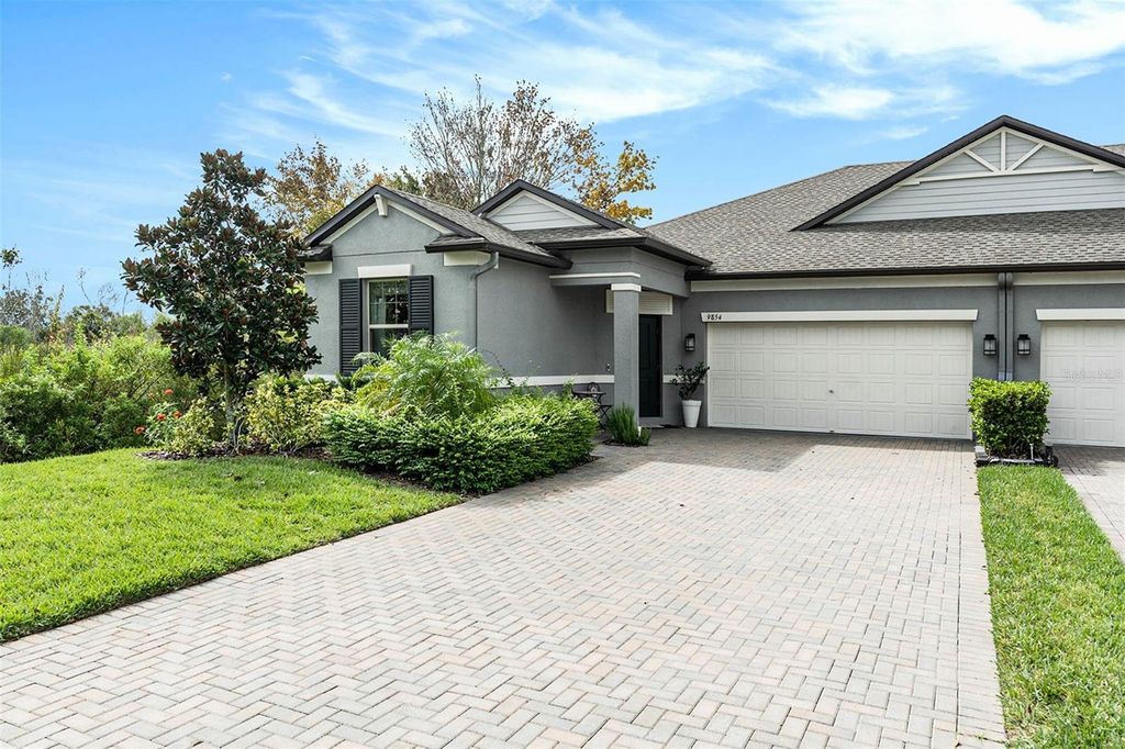 Photo of 9854 Red Bay Loop, Land O Lakes, FL 34637 (MLS # TB8438024)