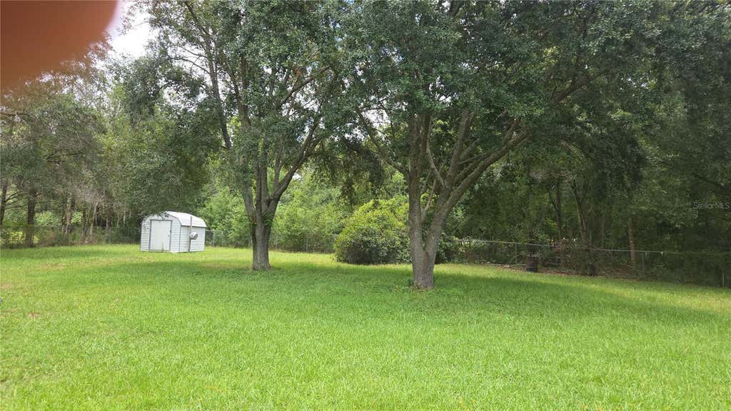 Photo of 9750 Ehren Cutoff, Land O Lakes, FL 34639 (MLS # TB8541216)